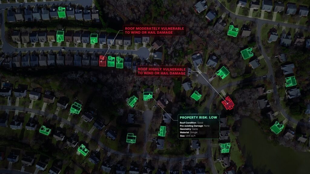 A neighborhood being analyzed at scale on geospatial imagery. Some homes are green and some are red. One green home reads "Property Risk: Low" while a red home reads "Roof Highly Vulnerable to Wind or Hail Damage".