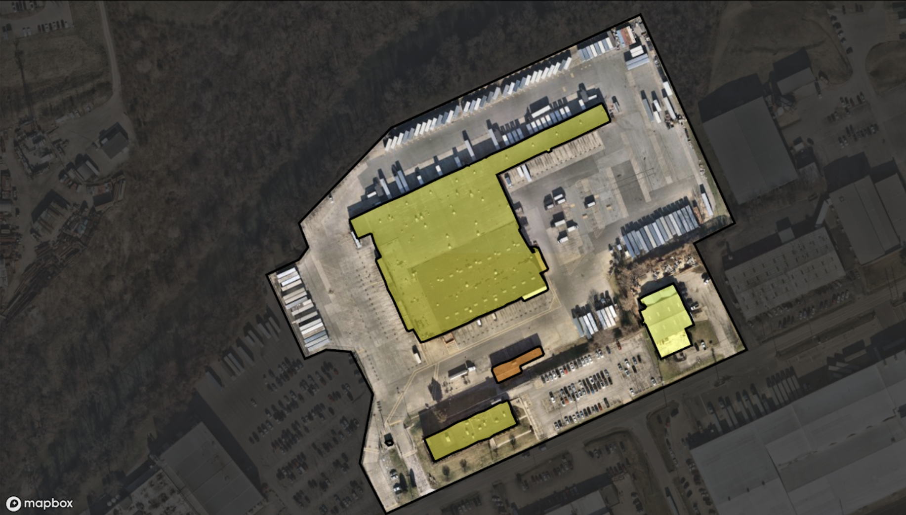 A geospatial image of a commercial warehouse being analyzed for its roof's condition